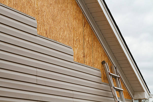 Professional Siding Replacement technician working in Williamsburg, OH